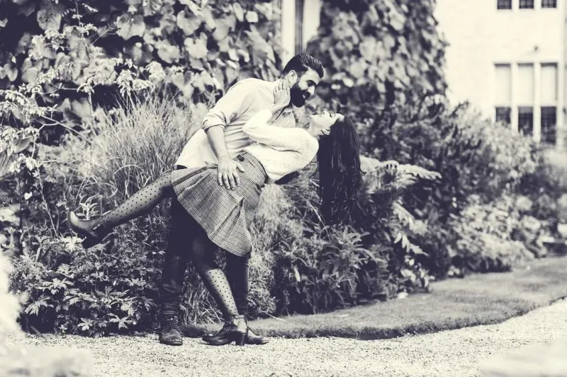 Couple doing romance in the garden.