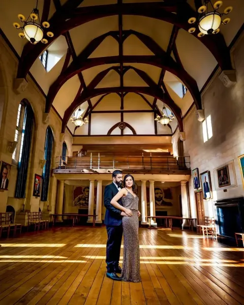 Couple pre-wedding photoshoot  in a museum background.