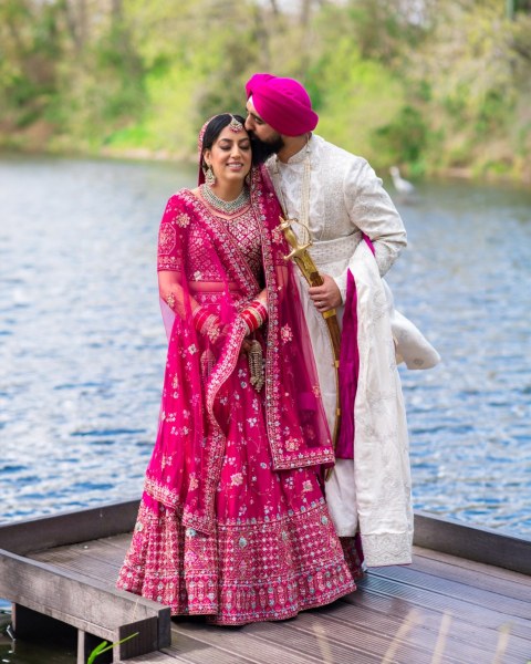 Asian couple by the lake