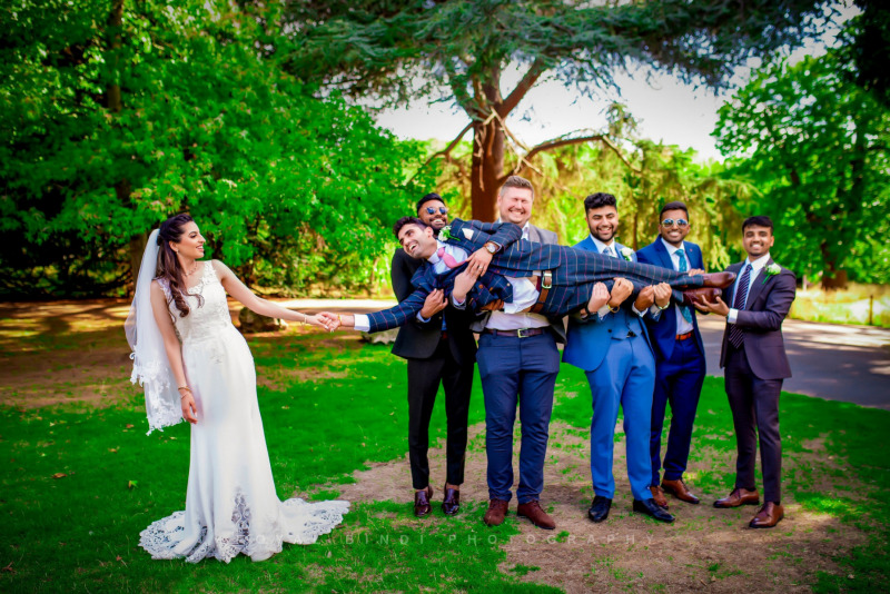 a bride, her groom, and his groom's men