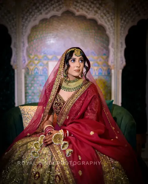 Sikh bride wearing traditional attire at her wedding day.