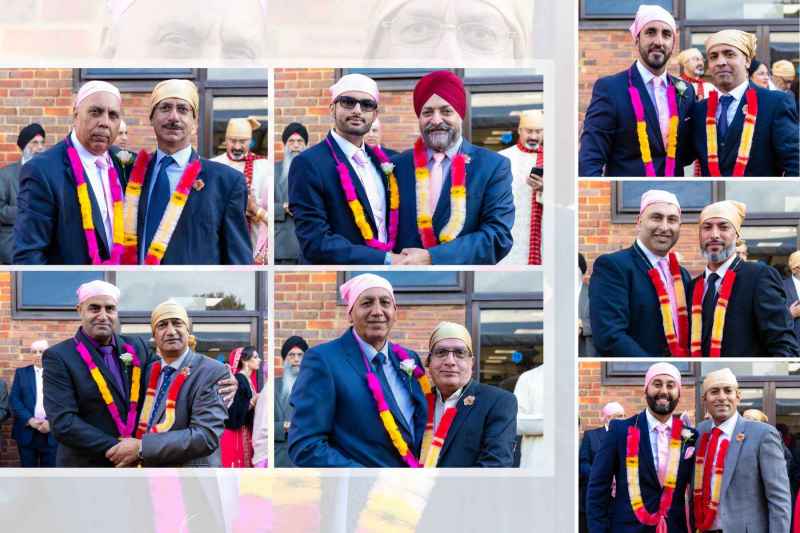 Group of men in suits wearing colorful garlands and traditional head coverings during a cultural event outdoors.