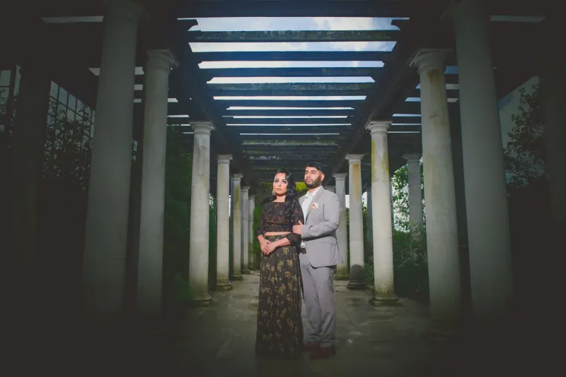 Couple photography with dark background.