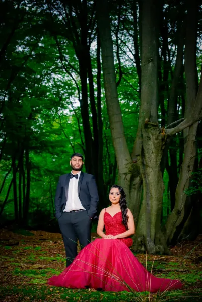 Couple photoshoot with the forest background.