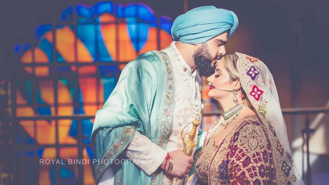 The Kiss, Capturing the Couple’s Intimate Moment of Love and Celebration