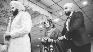 Anand Karaj ceremony of Sikh couple at the Gurdwara.