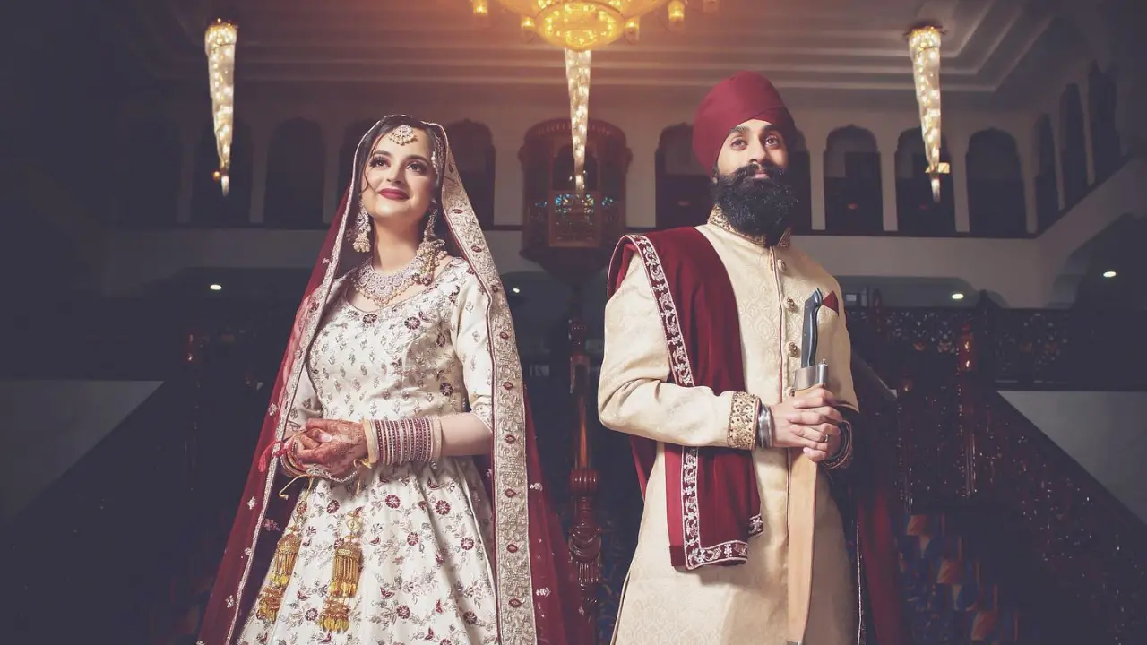 Bride and groom during at the Sri Guru Nanak Darbar Gurdwara in Gravesend.