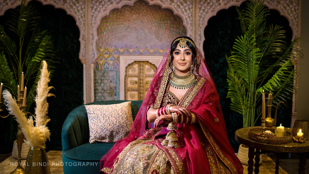 Indian bride, sitting on a sofa