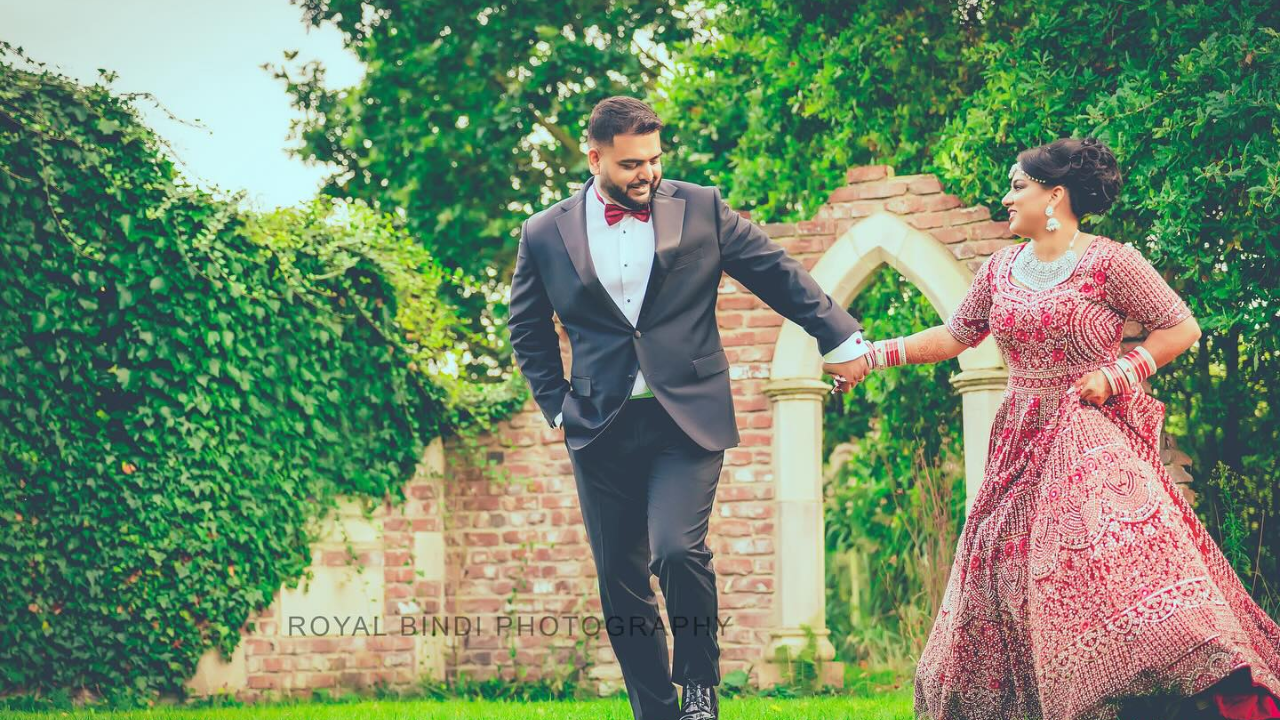 the couple walking back up the aisle