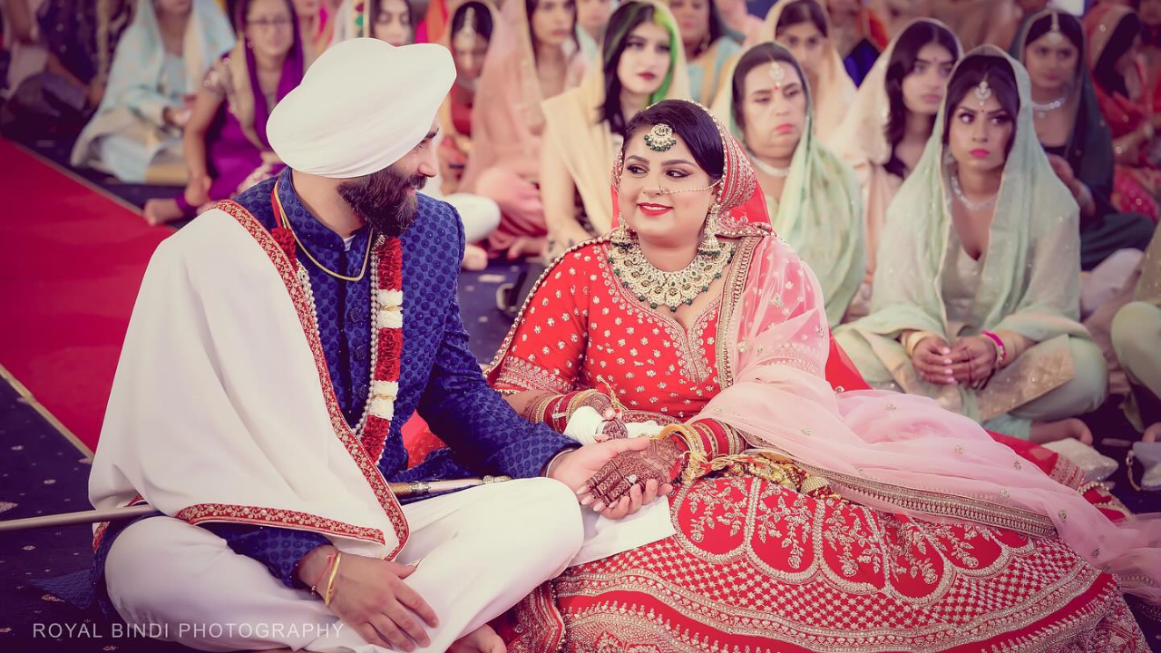 The Couple Signing the Register Officially Marking the Beginning of Their Married Life