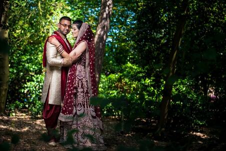 A Hindu bride and groom photo shoot in the woods