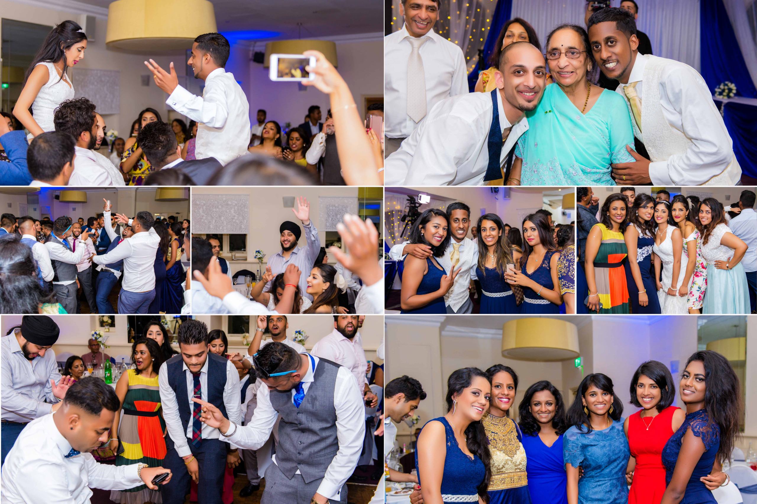 Group of people dancing and posing at a lively wedding reception.