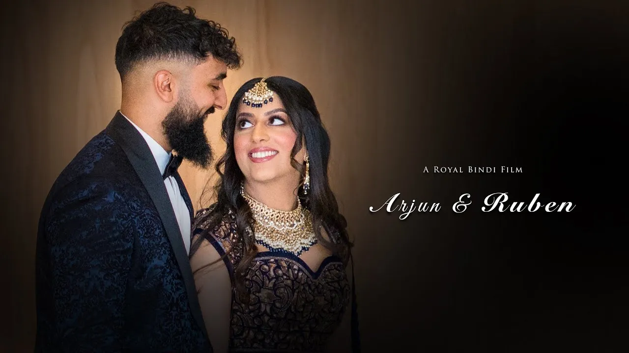 Arjun and Ruben standing together during their Sikh wedding in Meridian Grand.