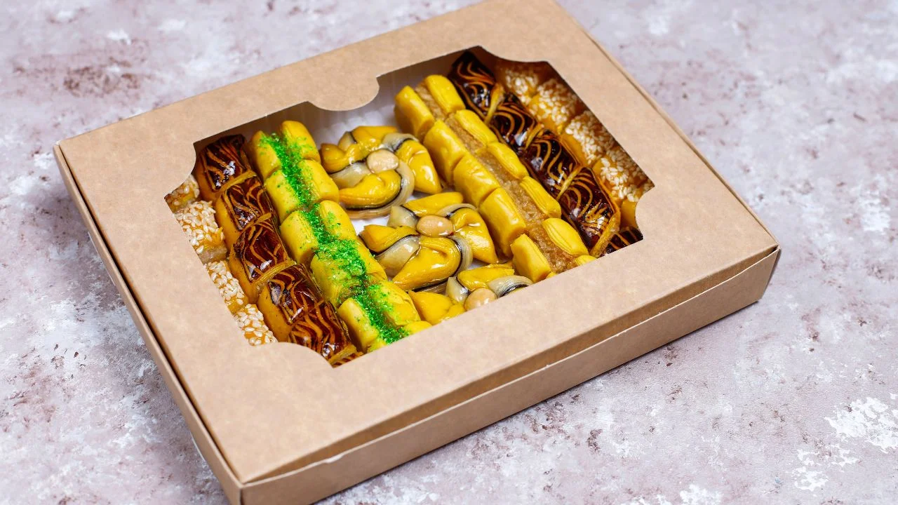 Mithai box filled with baklava with nuts and honey