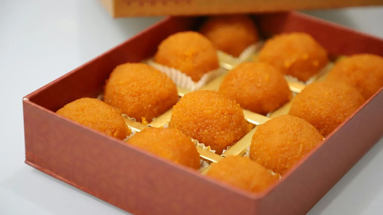 Box of Motichoor Laddu, a popular Indian sweet made with gram flour and sugar.