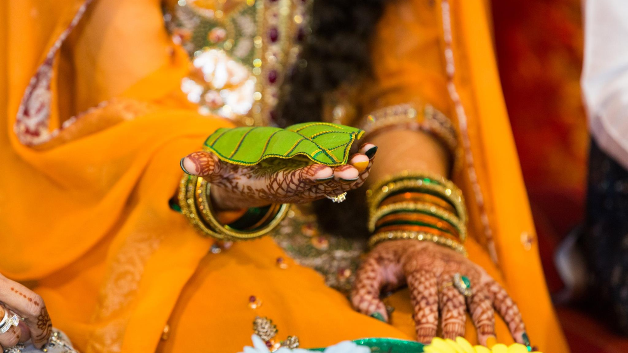 Bridal full hand mehndi design with intricate patterns.