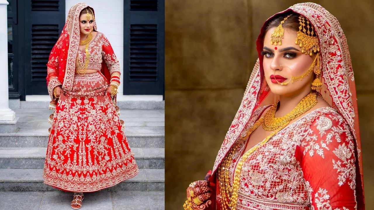 Bride wearing a traditional red lehenga with gold embroidery and dupatta on her shoulders.