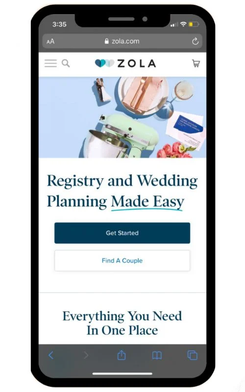 A screenshot of the Zola wedding registry homepage showing the Zola logo, a search bar, a shopping cart icon, a button to get started, a button to find a couple, and a tagline that says "Everything You Need In One Place."