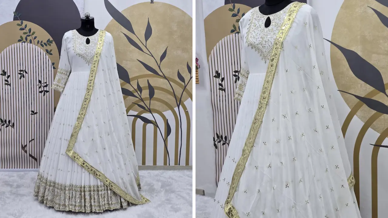 A white gown with gold embroidery on the neckline and hem, and a matching gold-trimmed dupatta.