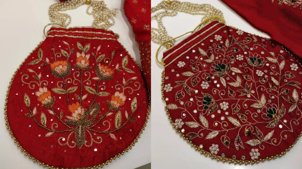 Two round red potli bags with intricate floral embroidery and pearl detailing.