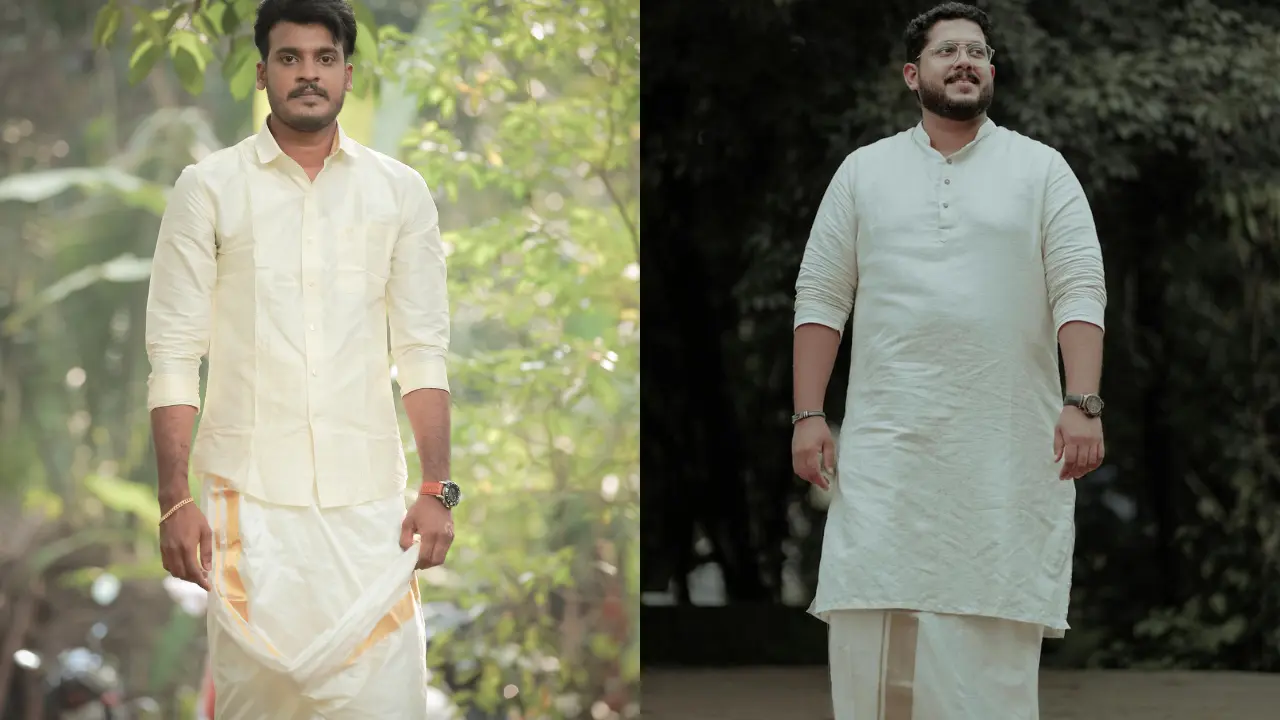 Two men wearing white kurtas and white dhotis are standing in a park. The man on the left is wearing a shirt over his kurta, and the man on the right is not. Both men are looking at the camera with serious expressions.