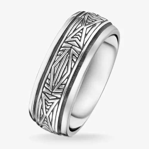 A silver band ring with a detailed geometric pattern on the surface.