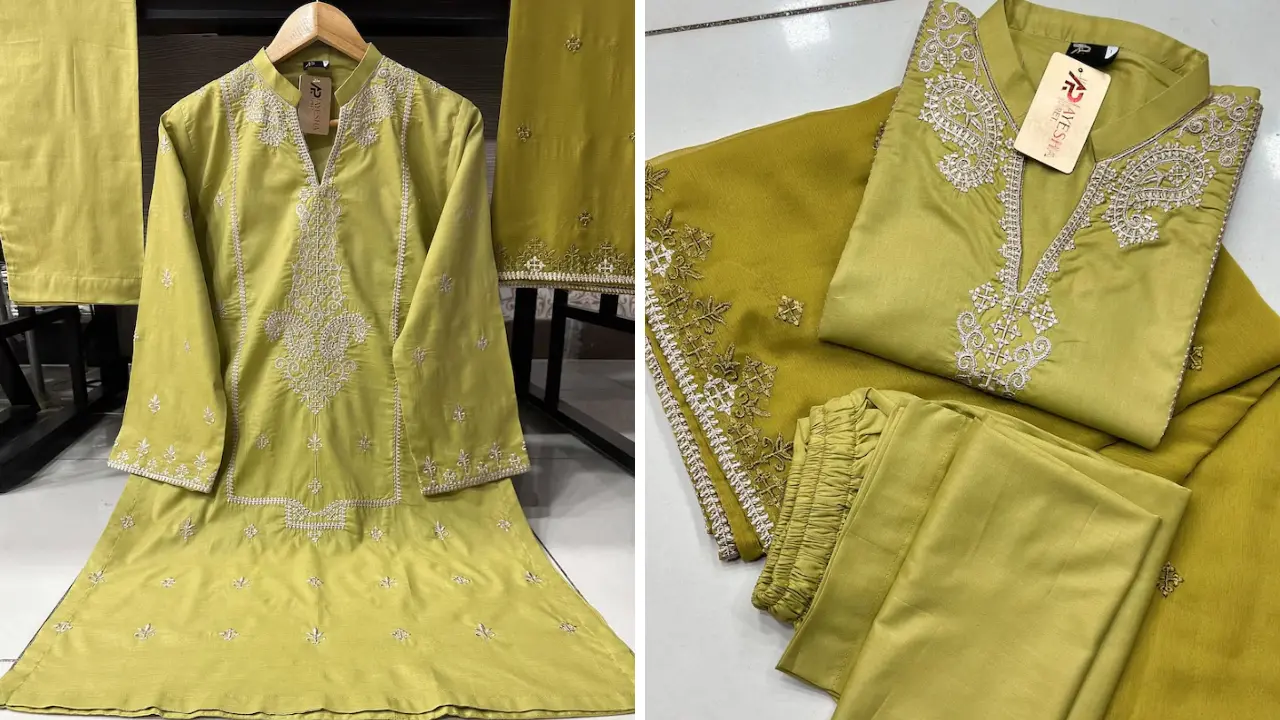 A green kurta with silver embroidery, paired with matching pants and a dupatta.