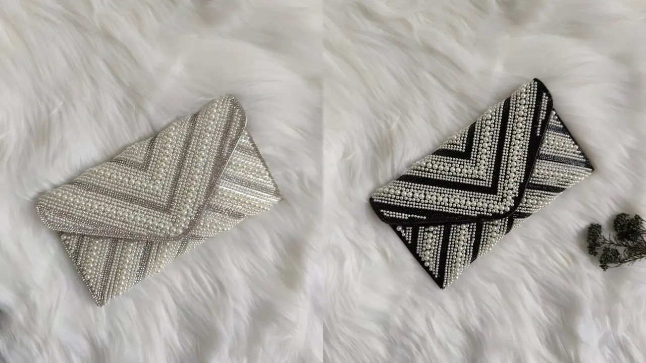 Two beaded clutches, one white and one black, with a chevron pattern, displayed on a white fur background.