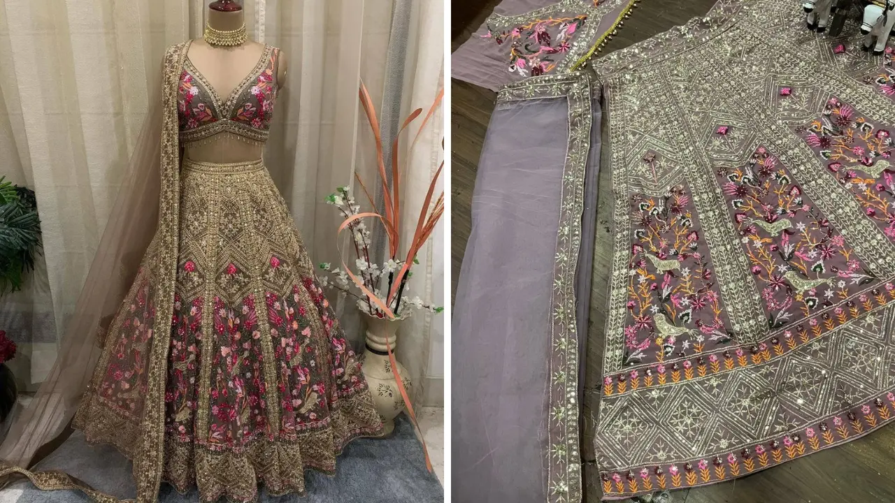 A grey lehenga choli with intricate floral embroidery and sequins.