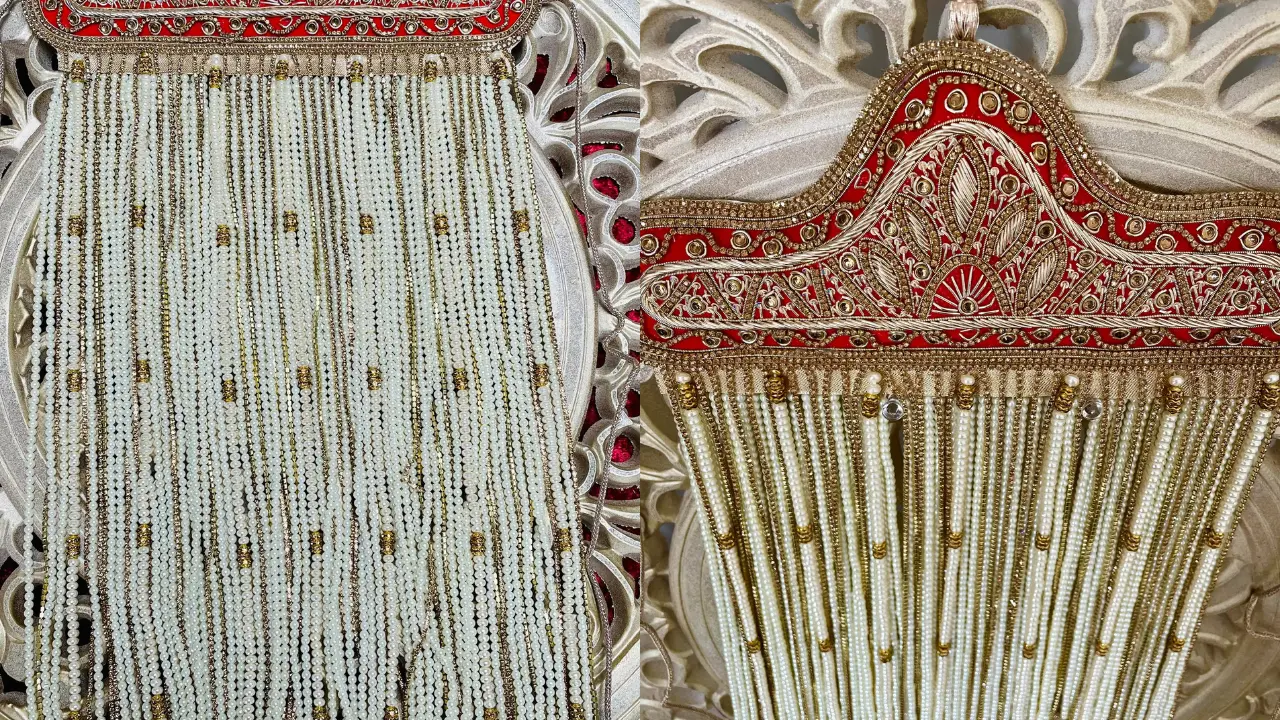 A Sehra, a traditional Indian groom's headpiece, featuring intricate embroidery and long pearl tassels.