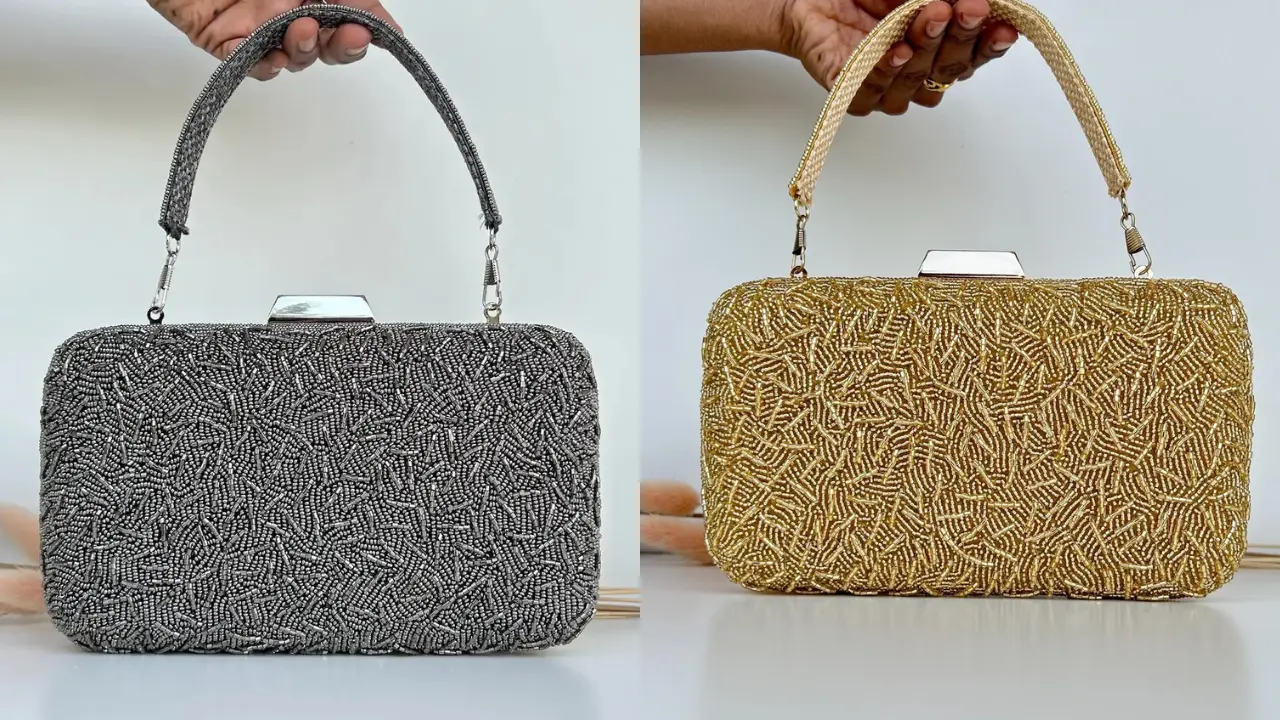 A set of two beaded clutches, one in silver and one in gold, held by hands.