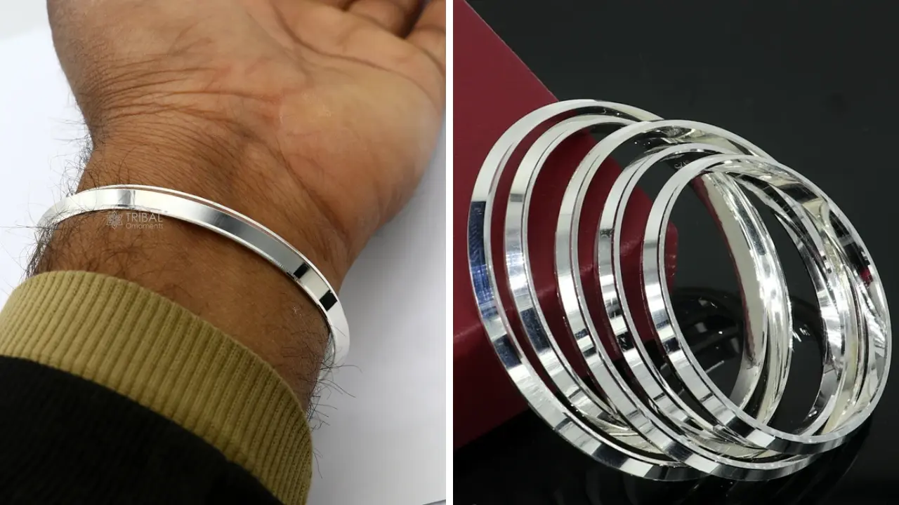 A close-up of silver bangles, showcasing their design.