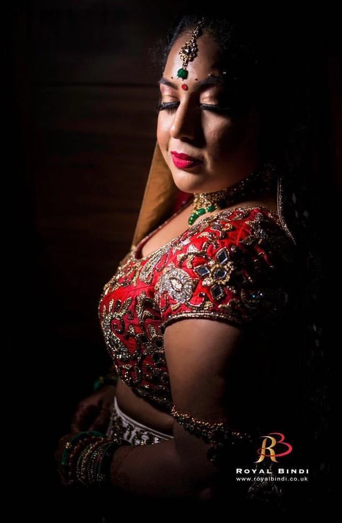 Close-up of a bride in elegant Gujarati bridal attire, beautifully captured during her wedding session.